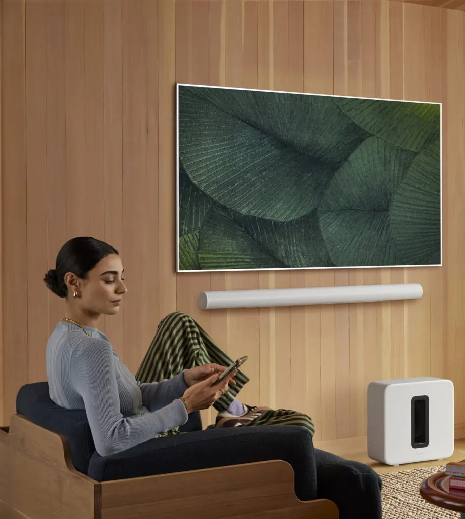 Sonos Arc soundbar and Sub in a living room — home theatre system requiring clean network topology to stay connected