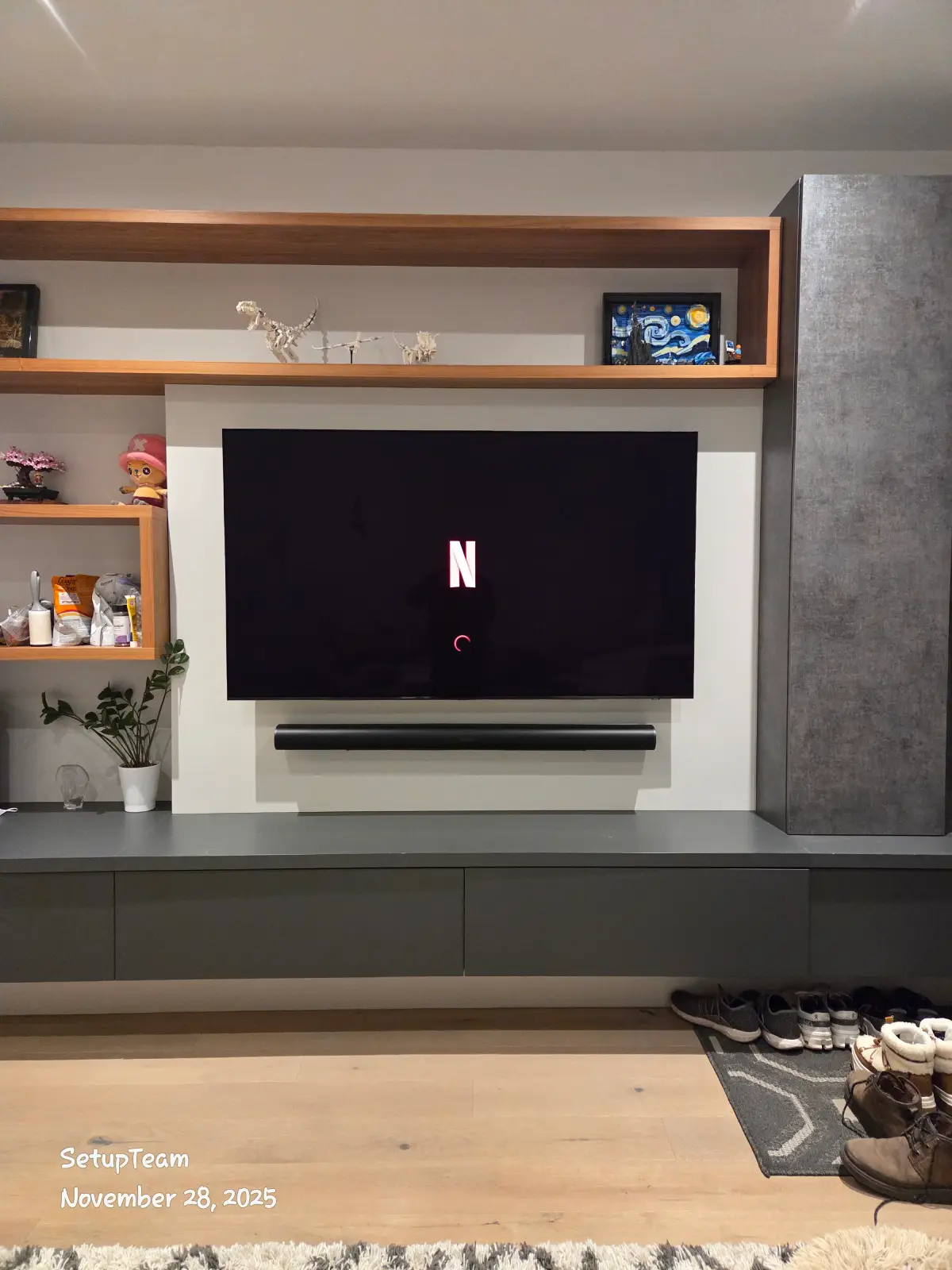 Custom millwork media wall with Samsung 65-inch OLED, Sonos Arc Ultra soundbar, and floating cabinetry — Eastlake, Oakville, SetupTeam