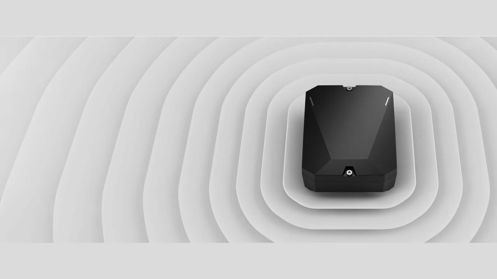Ajax MultiTransmitter module, which connects the wired door contacts and motion detectors of an existing hardwired alarm system to a wireless Ajax hub
