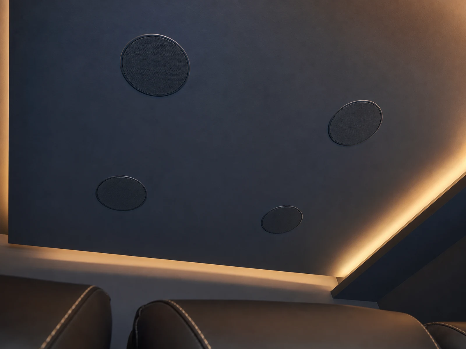 Four flush in-ceiling Dolby Atmos height speakers laid out in a precise rectangular pattern in a finished Markham basement theatre ceiling