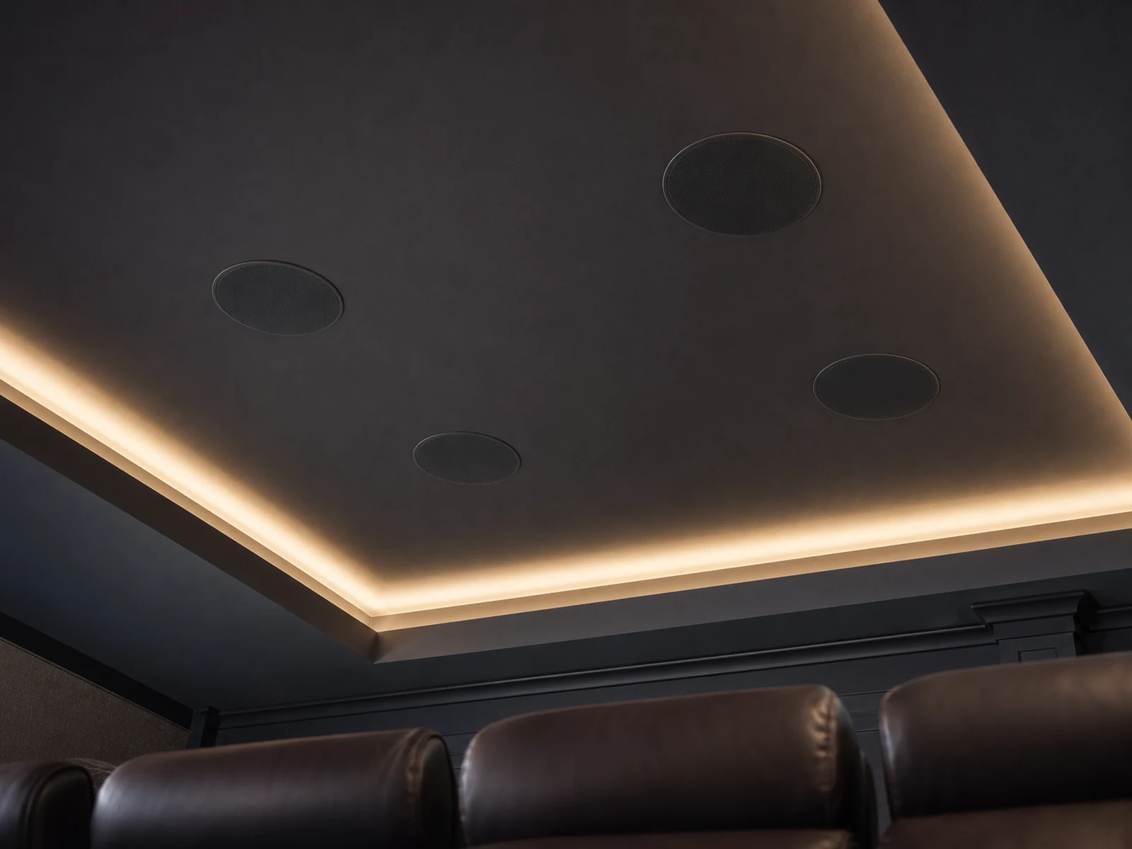 In-ceiling Dolby Atmos height speakers installed flush in a finished Oakville home theatre ceiling