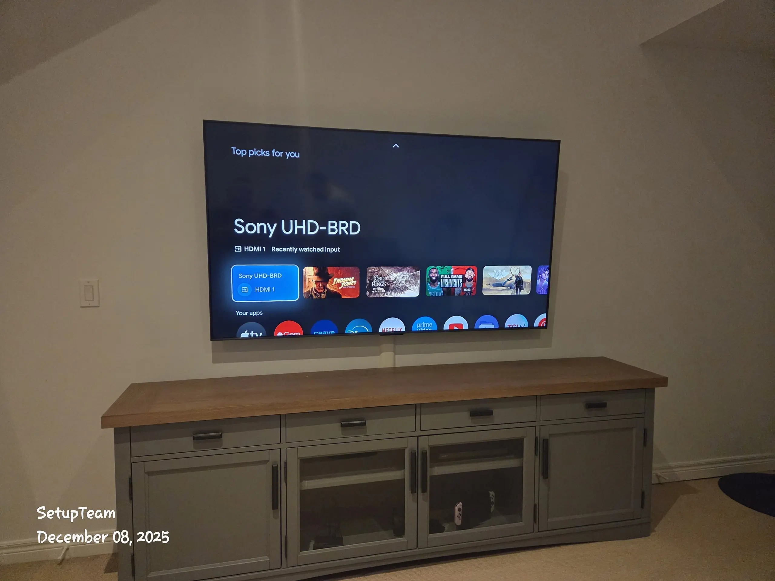 75-inch TV in midtown Toronto, all wires hidden