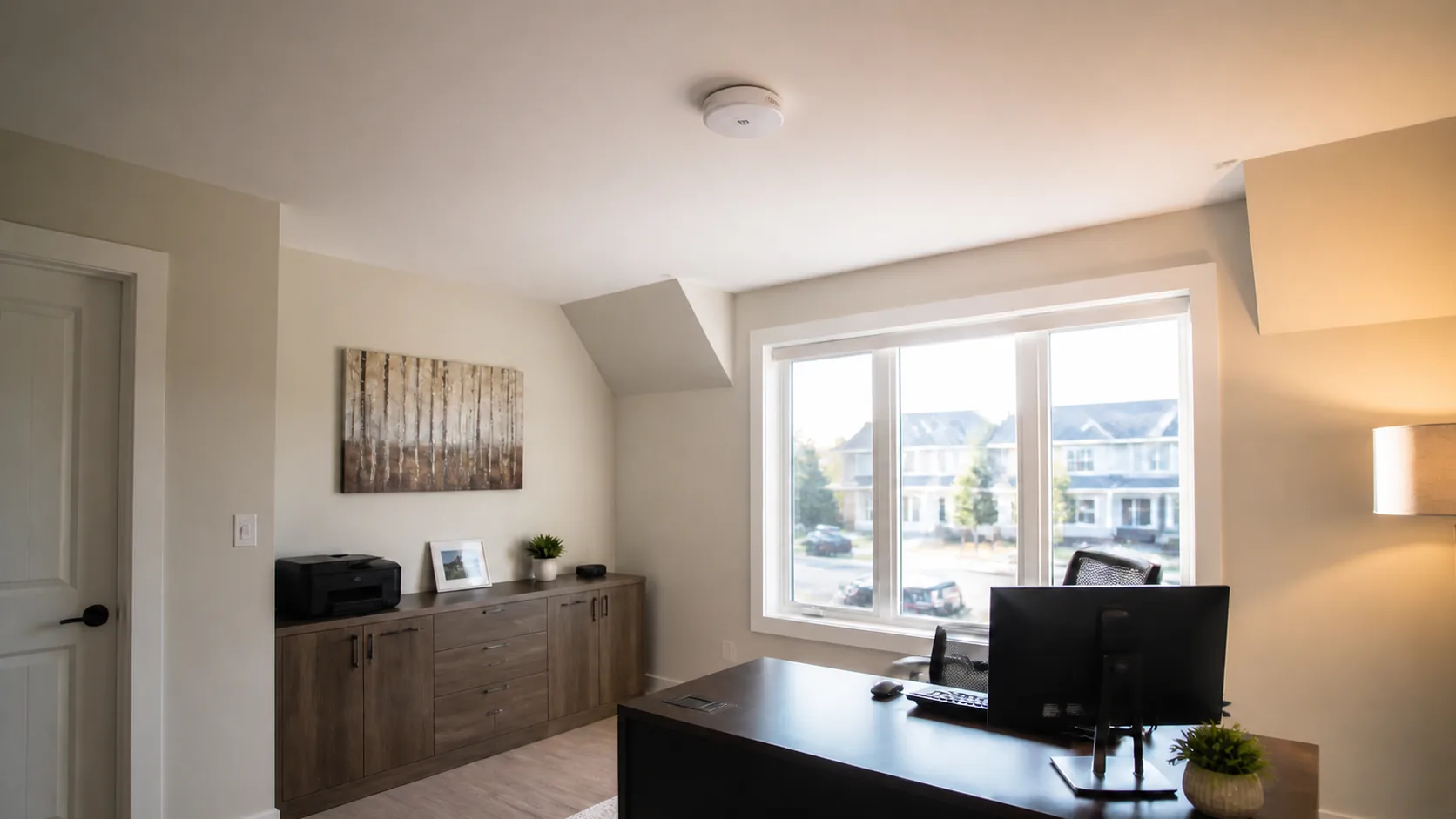 Ceiling Wi-Fi access point in a finished above-garage home office in a Newmarket new-build home