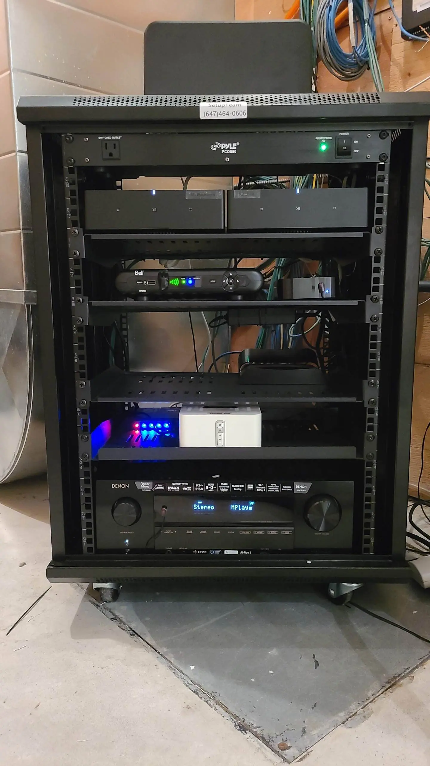 Vertical wall-mounted TV install with concealed cabling