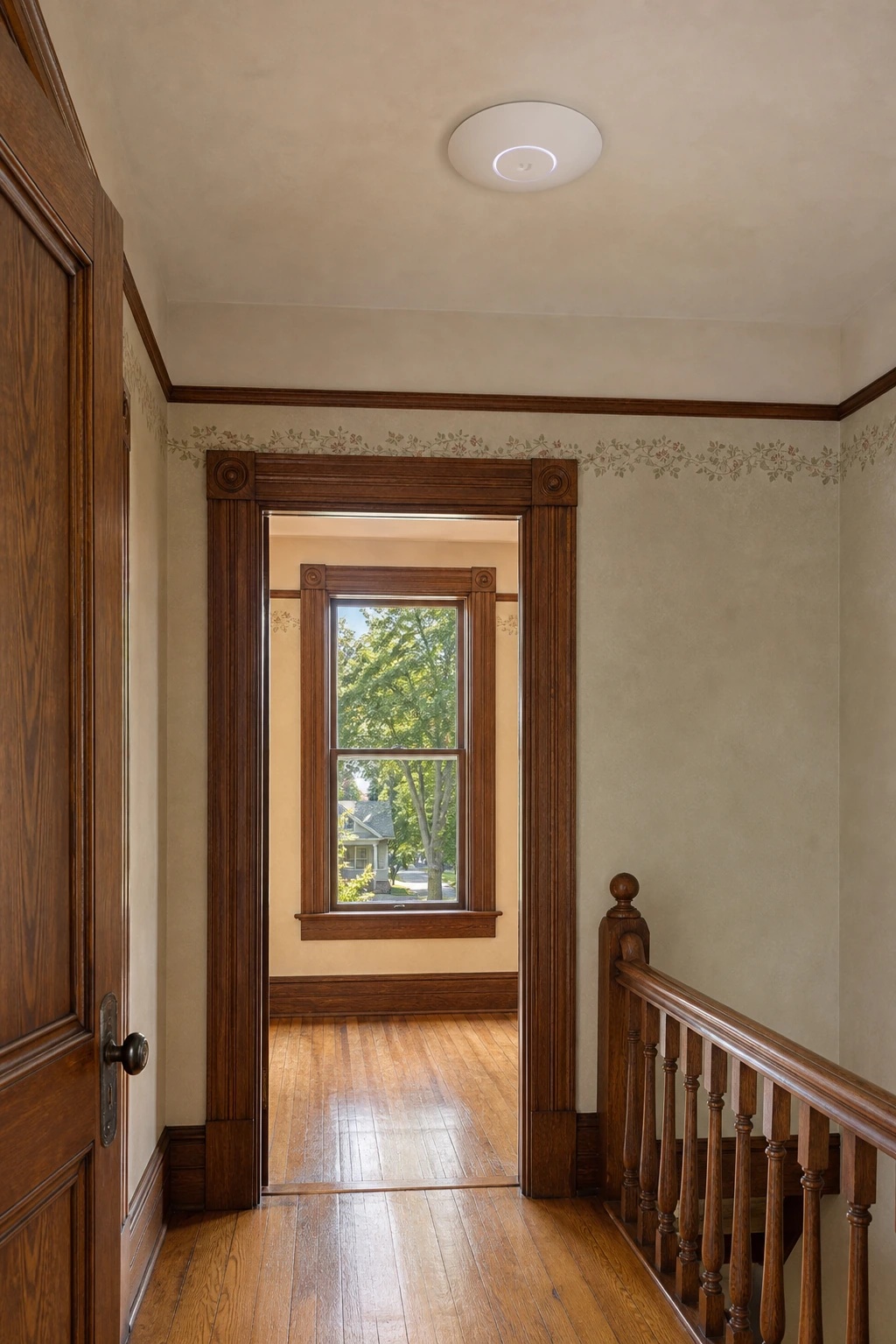 A UniFi U6 Pro access point flush-mounted to a plaster-and-lath ceiling inside a late-nineteenth-century Northeast Old Aurora Heritage Conservation District detached home, with concealed Cat6 backhaul respecting the heritage interior detailing and a tree-lined avenue with grassed boulevards visible through the window
