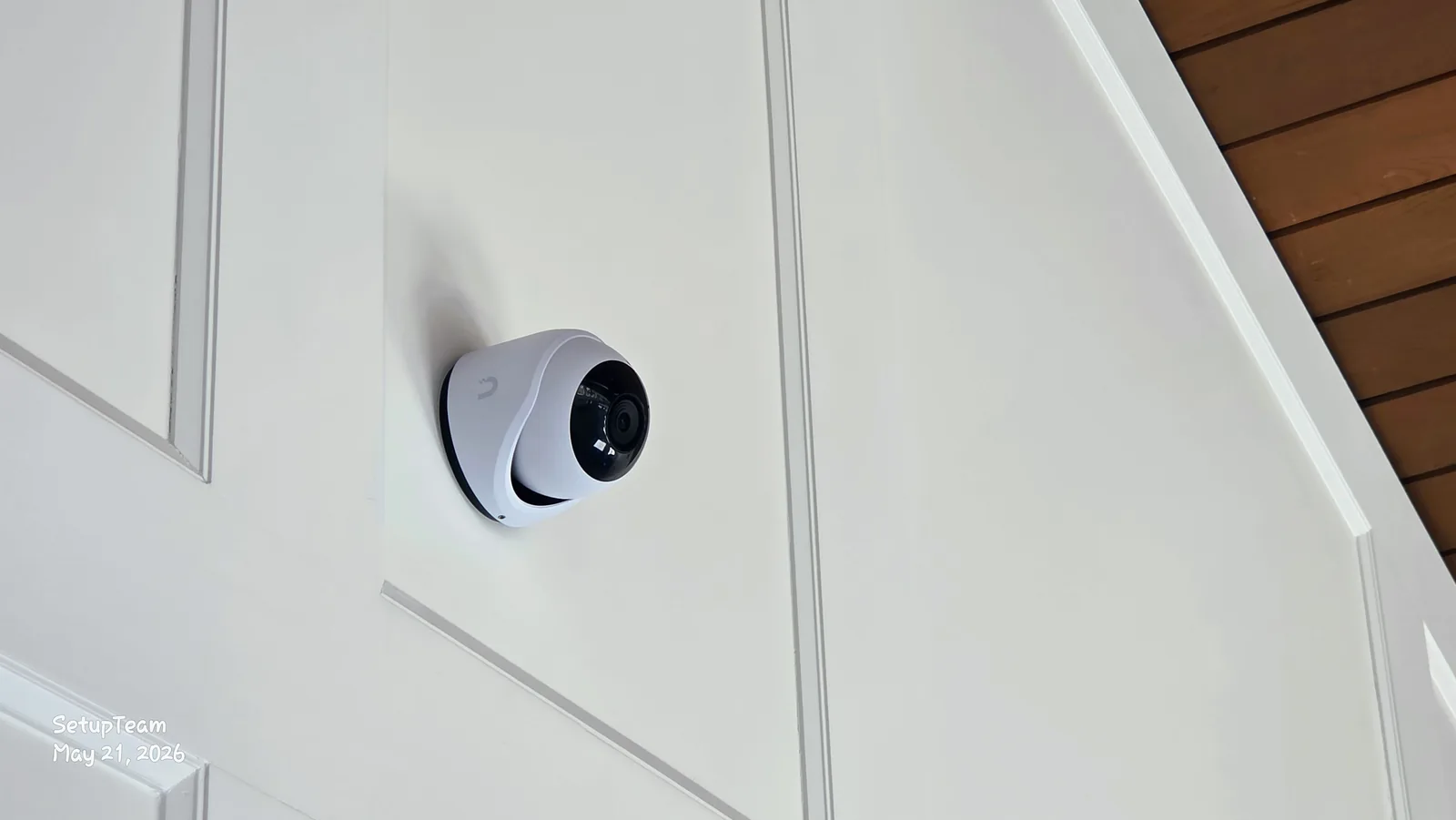 White UniFi turret security camera cleanly mounted on a residential exterior wall — SetupTeam security camera installation in Toronto and the GTA