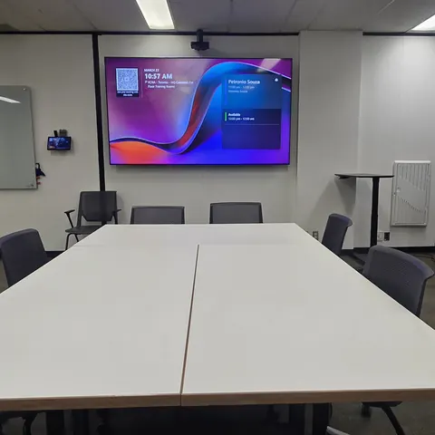 98-inch Samsung commercial display installation with Yealink video conferencing system in a corporate training room completed by SetupTeam in Toronto.