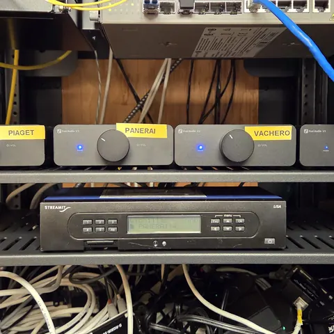 Commercial multi-zone audio distribution rack with centralized audio control and structured network integration in Toronto.