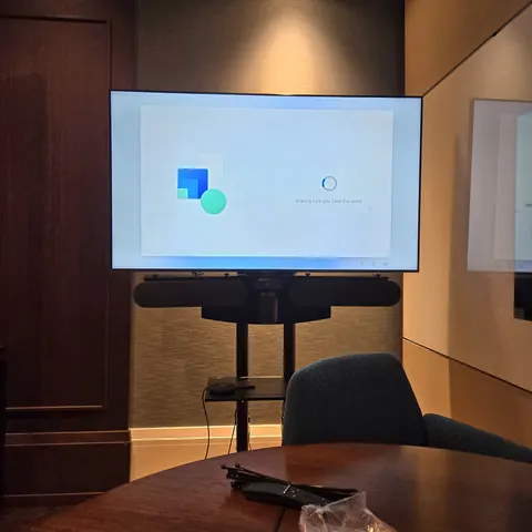 Professional conference room AV installation with commercial display, video conferencing system, and meeting room technology integration in Toronto.