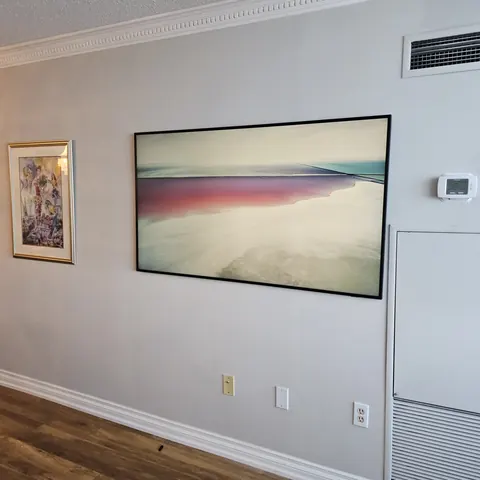 Samsung Frame TV wall mounting installation in a modern condo completed by SetupTeam in Toronto.