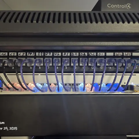 UniFi USW Pro Max switch with structured patch panel and commercial network rack installation in Vaughan.