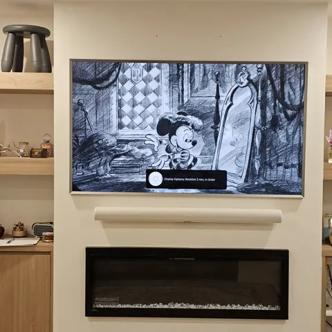 Samsung Frame TV installation above a modern fireplace with Sonos Arc Ultra soundbar completed by SetupTeam in Toronto.