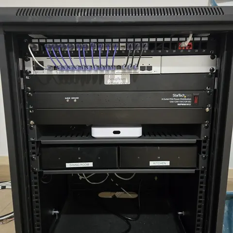 Professional network cabinet installation with UniFi networking equipment and Sonos Amp audio distribution system completed by SetupTeam in Vaughan.