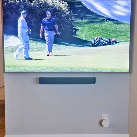 Professional Frame TV wall mounting with Sonos soundbar installation and concealed wiring for a clean modern setup in Oakville.