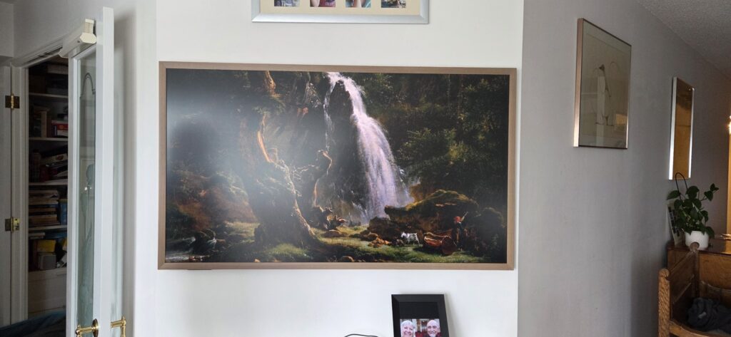 TV Wall Mounting Hisense CanvasTV wall-mounted in a condo with a clean, art-style finish