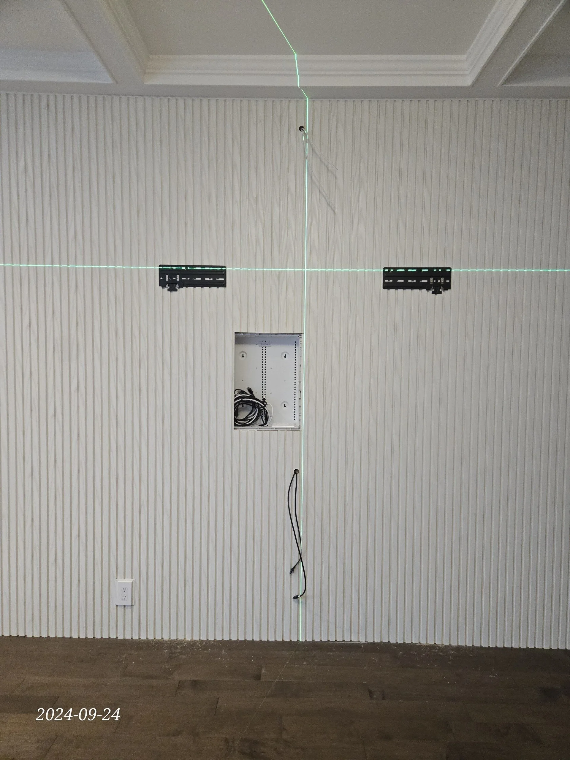 Pre-construction wall preparation for Samsung Frame TV — low-voltage enclosure, laser level and cable rough-in by SetupTeam