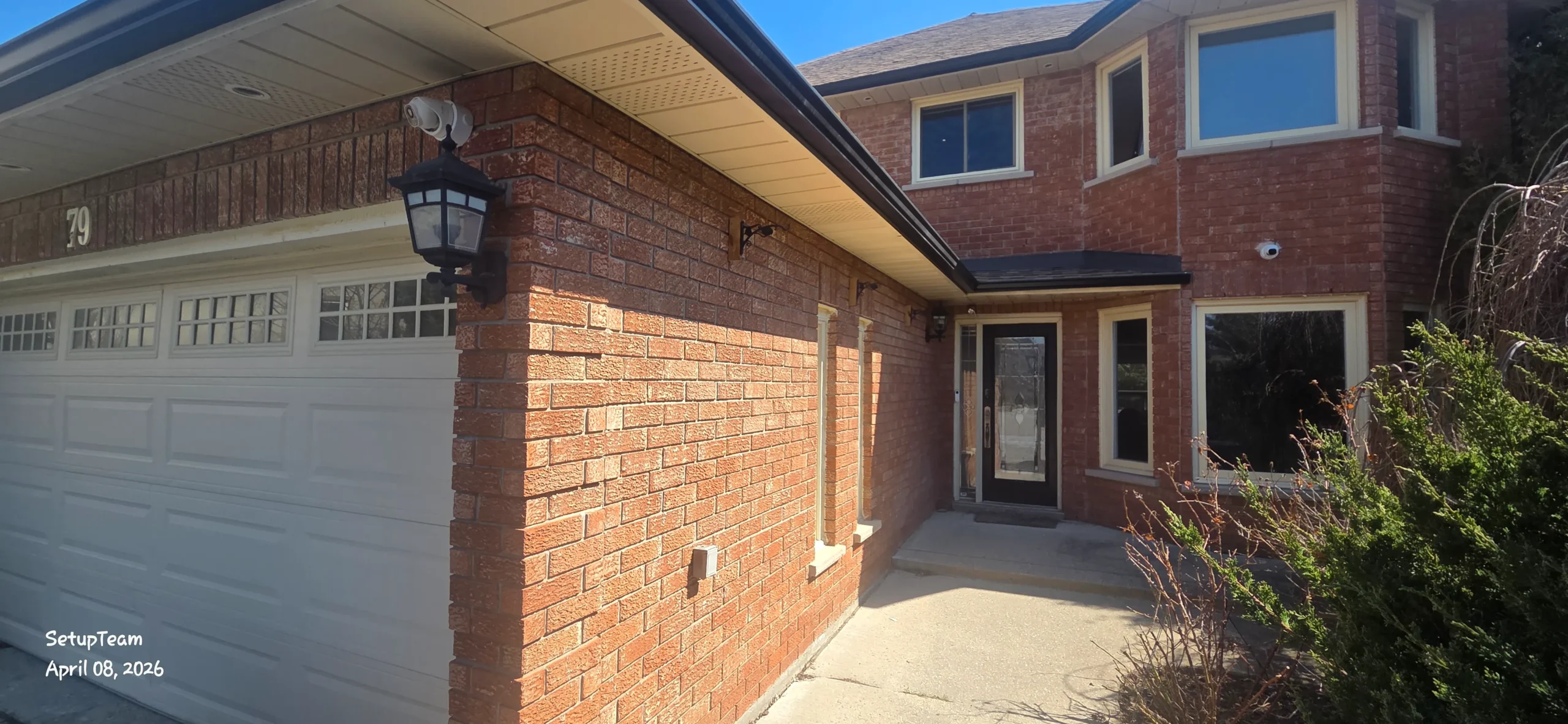 Mississauga residential exterior with visible security camera coverage points