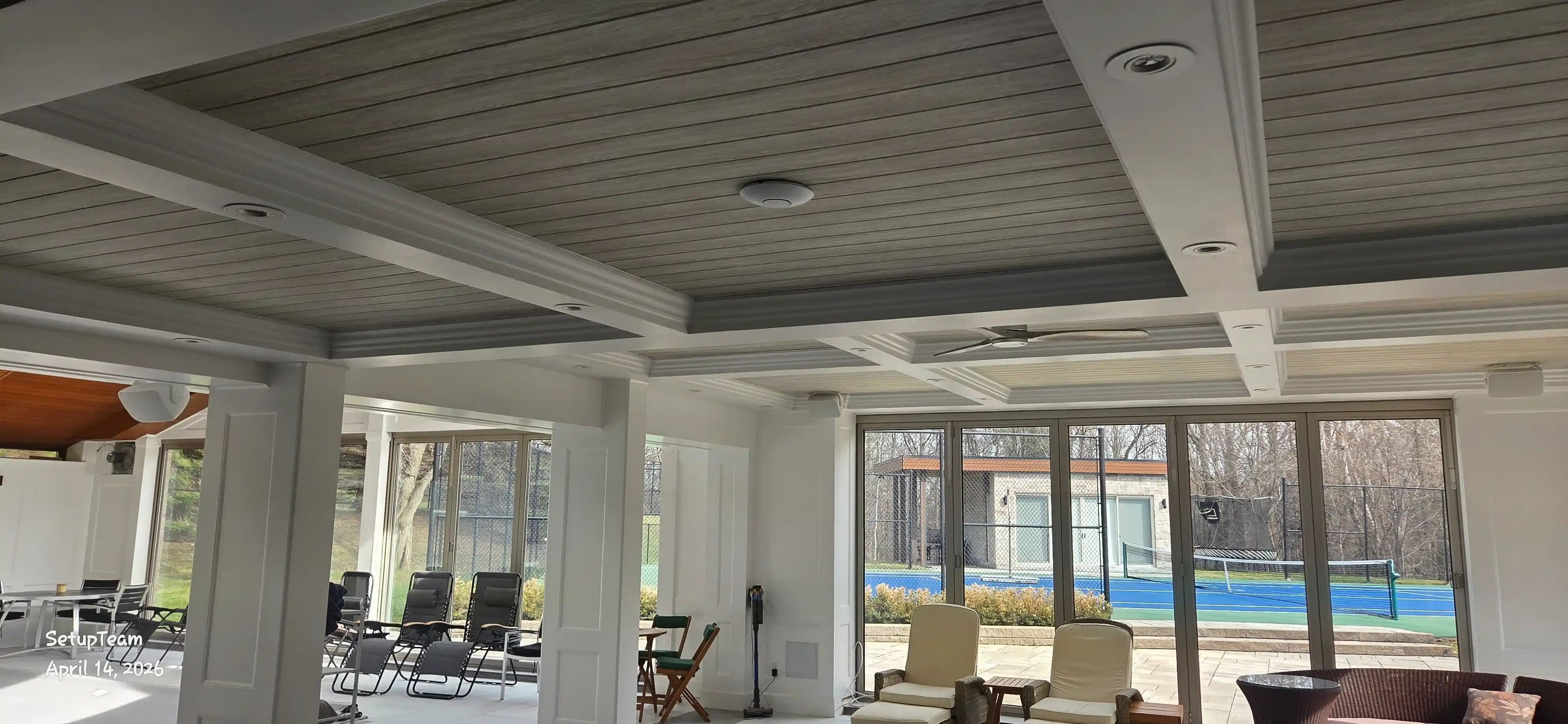 UniFi access point installed in a custom indoor swimming pool area