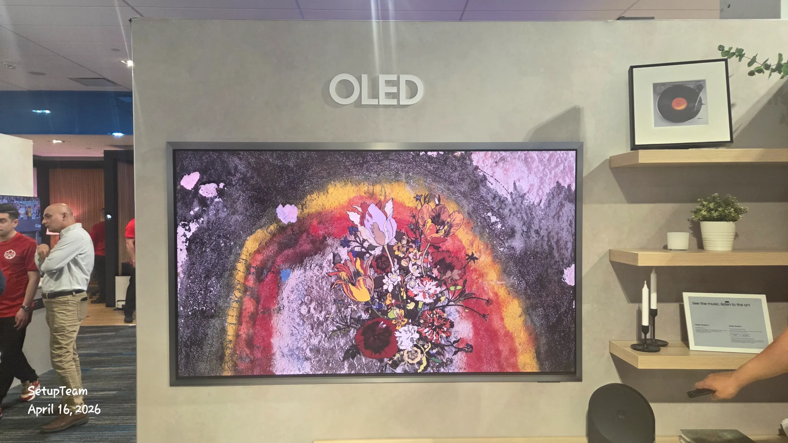 Samsung S95H OLED TV displaying Art Store content with FloatLayer design at the dealer event