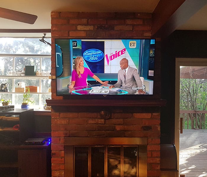 TV above fireplace